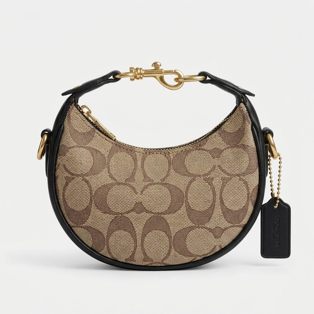 chic-pink-signature-canvas-half-moon-crossbody-bag